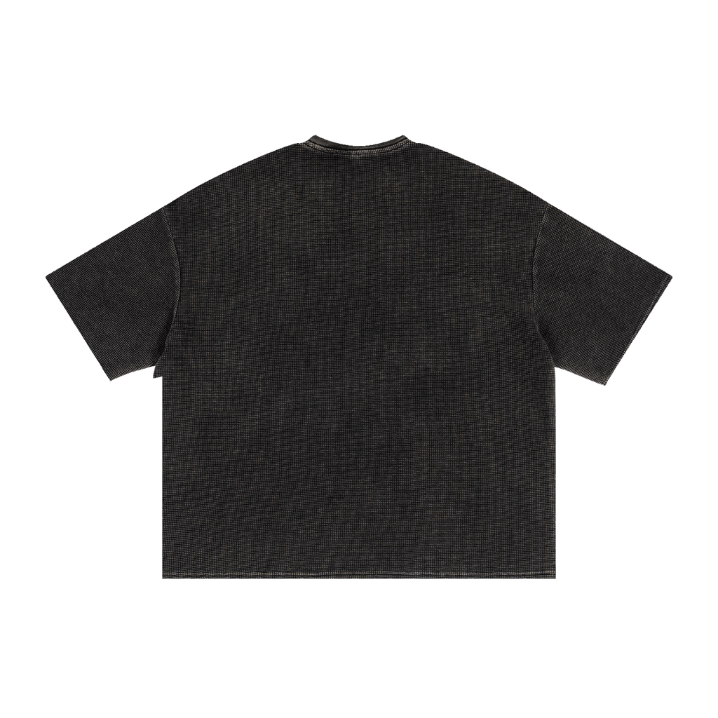 Black t-shirt with no branding on a white background