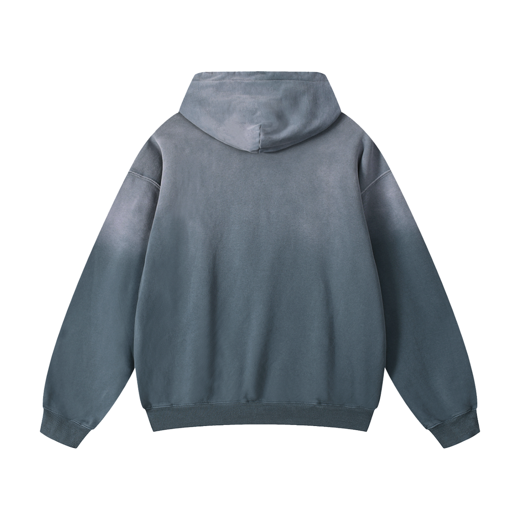Back view of a plain washed blue oversized hoodie.