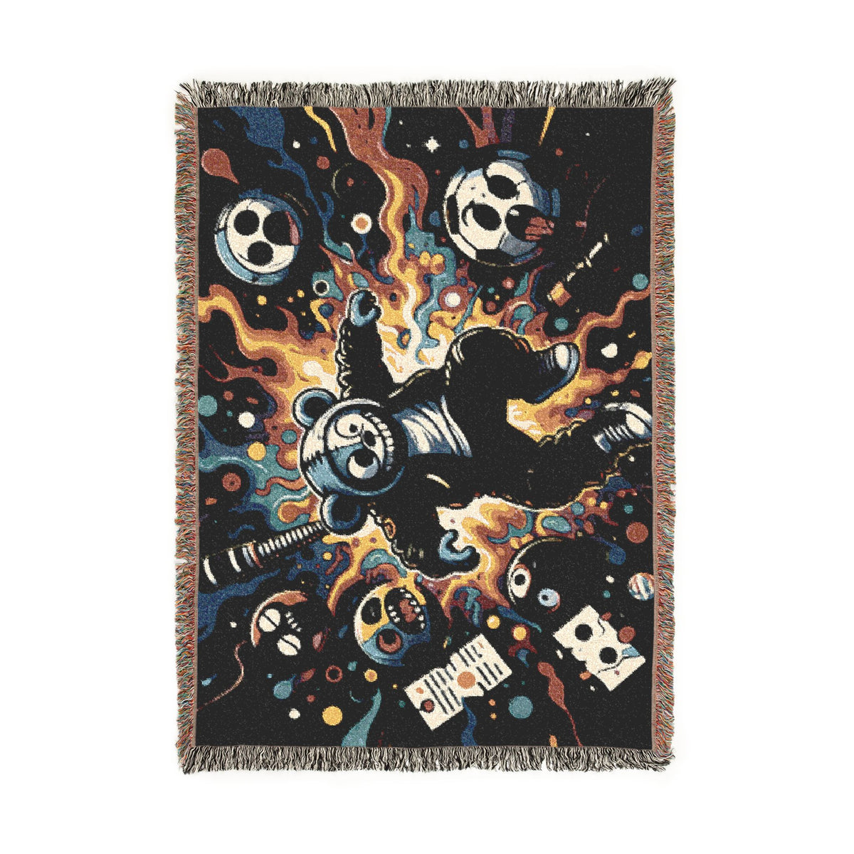 Woven blanket with dark cartoon animal and skull artwork displayed vertically.