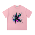 Front view of a pink tee with a black K and teal and magenta paint splashes.