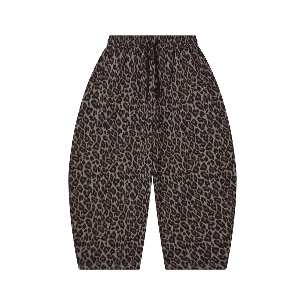 Leopard print wide-leg sweatpants with an elastic waistband and drawstring, shown flat against a solid white background.