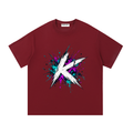 Front view of a dark red tee with a white K and colorful paint splashes.