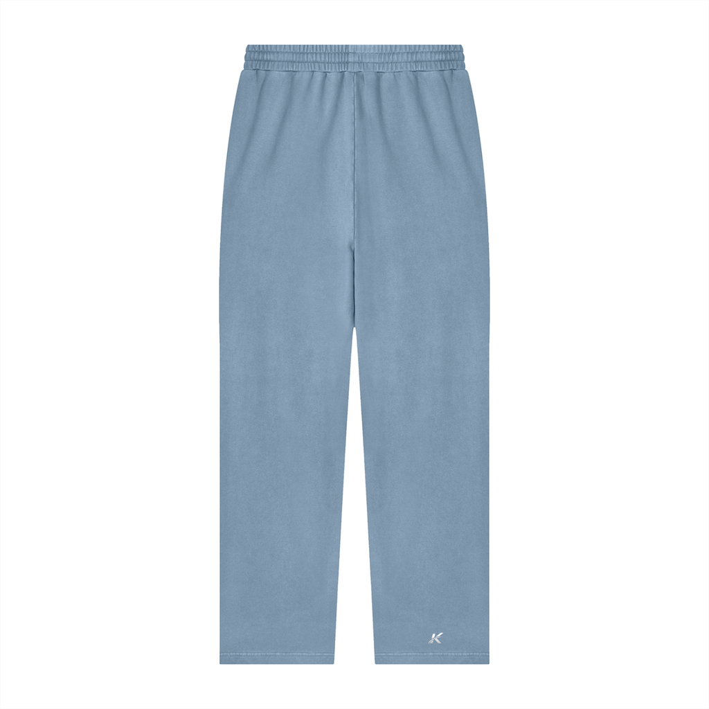 Light blue fleece jogger pants with an elastic waistband and a small white embroidered logo on the lower left leg, shown against a plain white background.