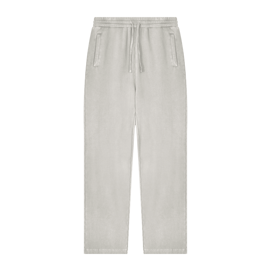 A pair of light beige drawstring sweatpants with side pockets, shown flat against a solid white background.