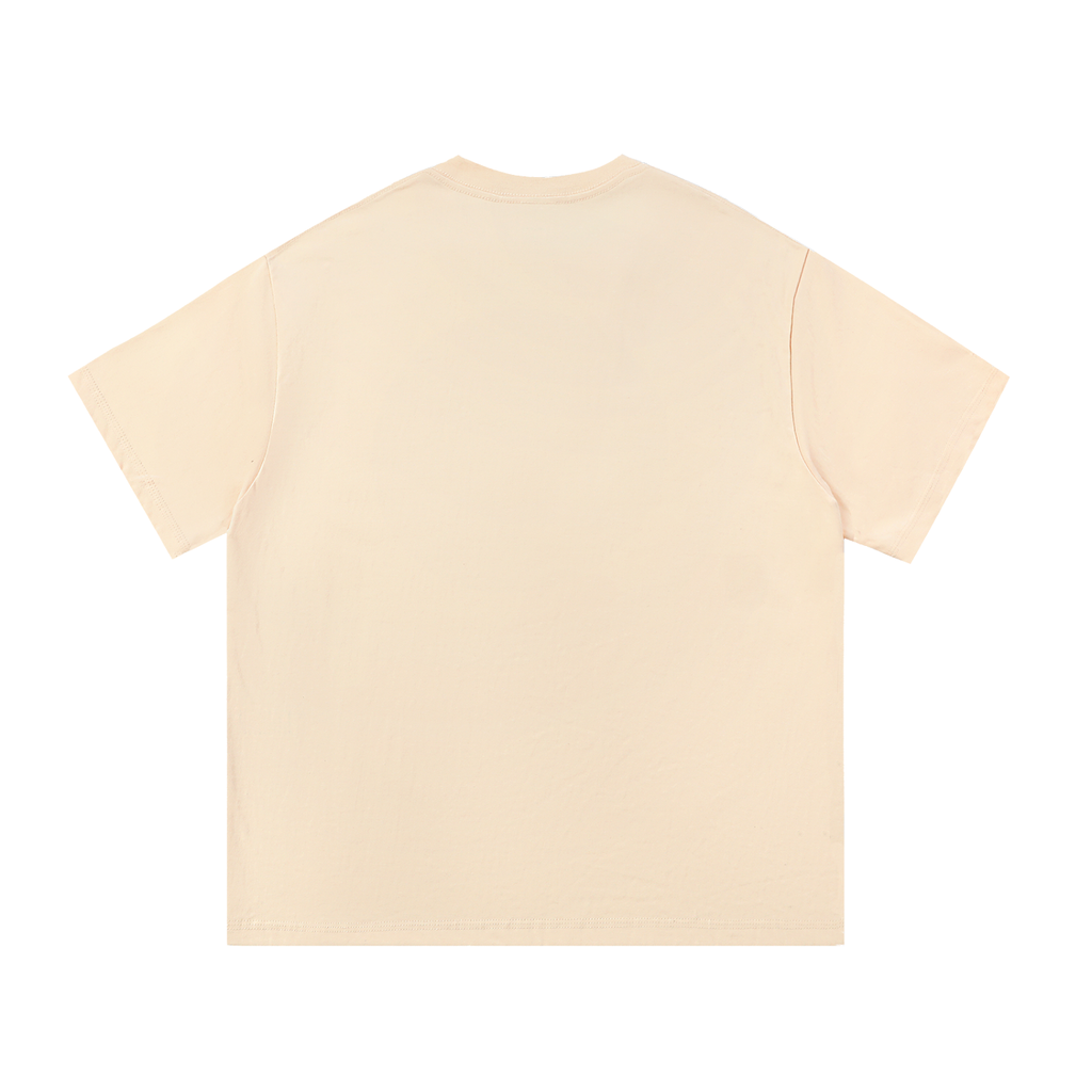 Back view of a plain cream tee.